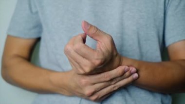 Close-up of a man's painful hand. Arthritis and massage treatment results for pain relief. Rheumatoid arthritis. Age and care.