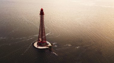 Beautiful seascape with lighthouse at sunset. aerial view, drone shot. Ukraine