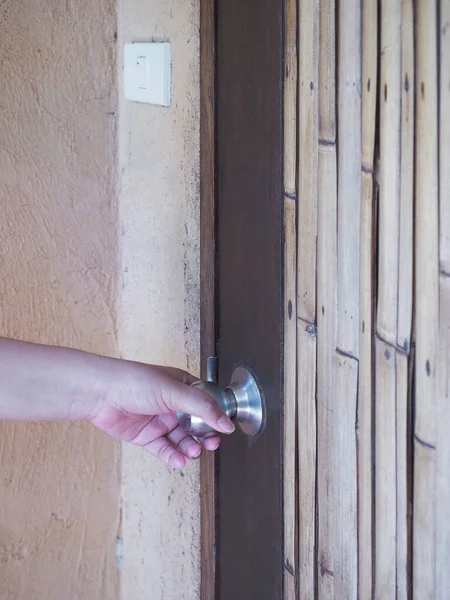 Woman Hand Holding Metal Vintage Knob Opening Wooden Door — Stock Photo, Image