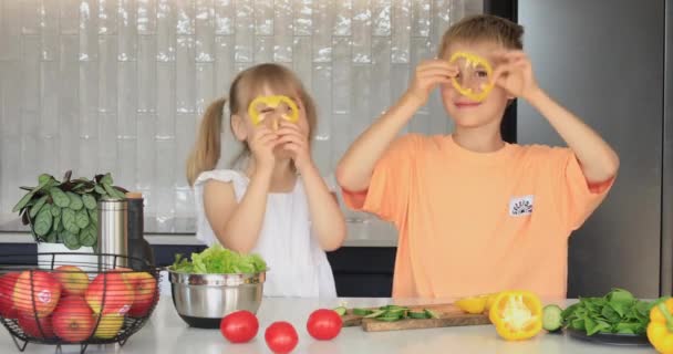 Funny Brother Sister Have Fun Kitchen While Making Salad Put — Stock Video