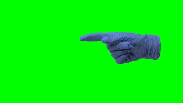 Mão Uma Luva Azul Médica Apontando Para Lado Com Dedo — Fotografia de Stock