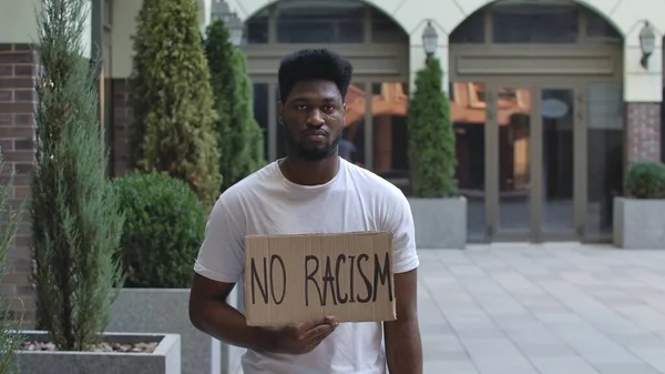 Young African American Man Stands Cardboard Poster Racism Public Outdoor — Stock Photo, Image