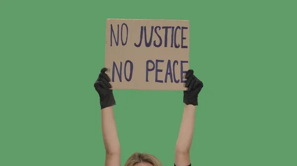 Hands Unknown Person Black Gloves Raise Cardboard Poster Justice Peace — Stock Photo, Image