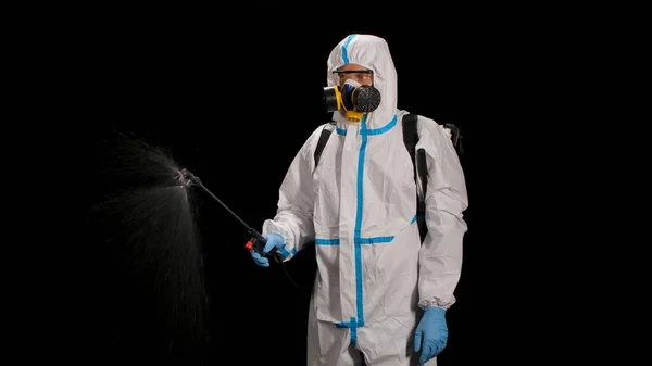 Trabajador Desinfectante Traje Blanco Protector Respirador Gafas Hace Desinfección Sobre —  Fotos de Stock