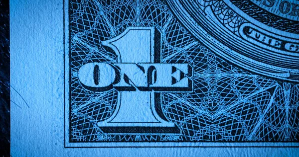 蓝色柔和光线下的一块钱纸钞 宏观拍摄的部分1美元的钞票 面额为一美元的钞票的一角 美国与第五任总统乔治 华盛顿的货币往来 — 图库照片