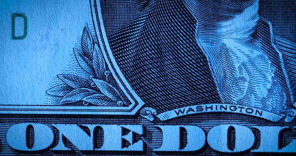 一张面值为一美元的纸钞正面有乔治 华盛顿第一任总统的肖像 美元现钞在宏观范围内 蓝色背景的钱 — 图库照片
