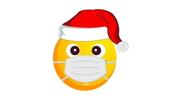 サンタクラスのクリスマスの帽子と白い背景に隔離された保護医療用マスクの黄色の絵文字ボール 休日のための自己分離と安全性の概念 冬の休日の感情 — ストック写真