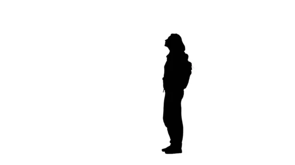 スポーツウェアとバックパック側に探して女性の黒のシルエット 観光客 旅行者 スポーツ女性の単一の図 白の背景に完全な長さでサイドビュー コンセプト — ストック写真