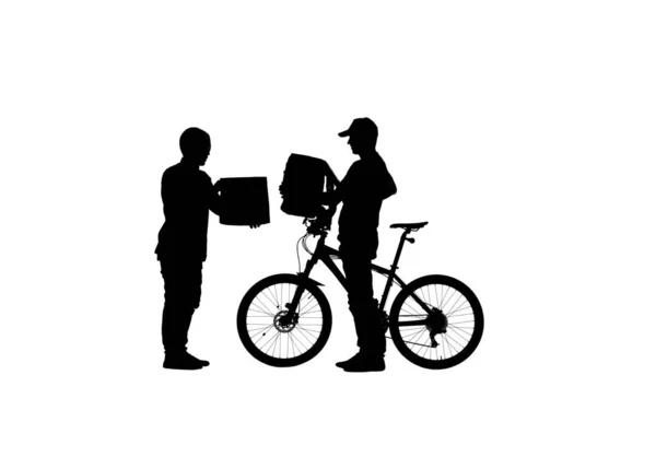 물건을 배신하는 남자의 실루엣 편대의 꾸러미 음식을 배달한다 자전거로 배달하는 — 스톡 사진