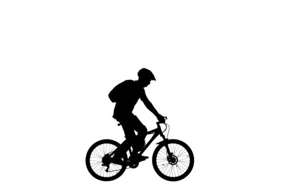 自転車用ヘルメットのサイクリストの黒いシルエットと白い背景のバックパックでサイドビュー 男性自転車のペダリングやスポーツバイクに乗る トレーニング アクティブな休息 アクティブスポーティ — ストック写真