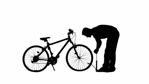 Oldalnézet Egy Fekete Sziluett Egy Férfi Felfújja Gumiabroncsot Kerékpár Kerék — Stock videók