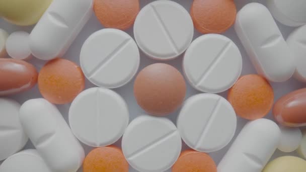 Widok Góry Wzór Tabletek Medycznych Tabletek Kapsułek Obracających Się Bliska — Wideo stockowe