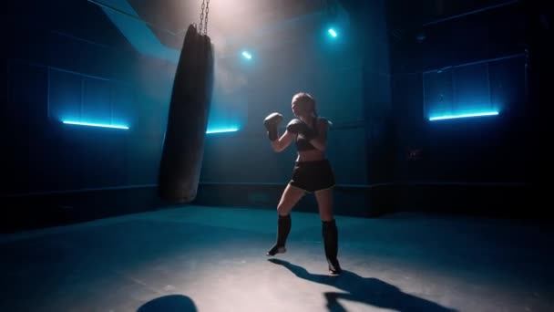 Kickboxing Training Dark Gym Blue Light Young Woman Fighter Black — Stock Video