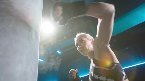 Low Viewing Angle Young Woman Delivering Powerful Punches Punchbag Female — Vídeo de Stock