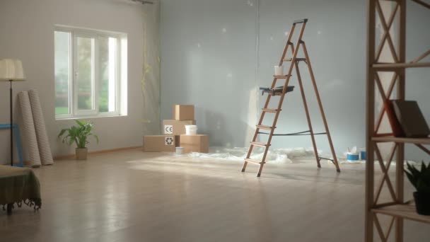 Interior Empty Apartment Renovation Stepladder Stacks Cardboard Boxes Floor Rolls — Stock video