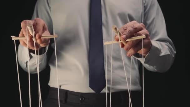 Businessman Gray Shirt Black Tie Controls Puppet Wooden Manipulator Strings — 비디오