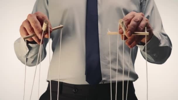 Businessman Gray Shirt Black Tie Controls Puppet Wooden Manipulator Strings — 图库视频影像