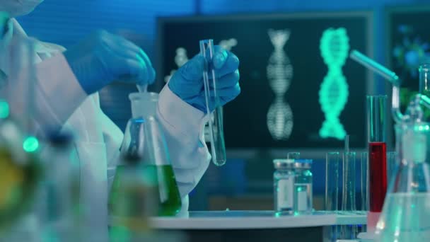 Female Scientist Pipettes Green Liquid Glass Test Tube Examines Sample — Video Stock