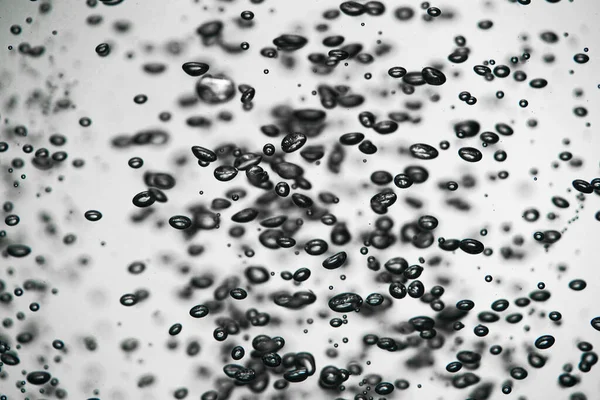 Lot Shiny Dark Air Bubbles Different Sizes Underwater White Isolated — Stock Photo, Image