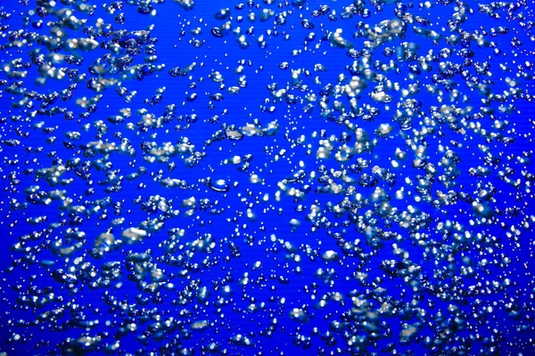 Lot Shiny Air Bubbles Different Sizes Underwater Blue Background Close — Stock Photo, Image