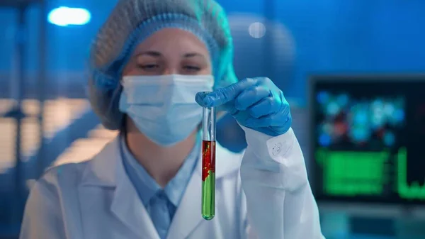 Female Observes Dissolution Spread Red Drop Substance Test Tube Green — Stock Photo, Image