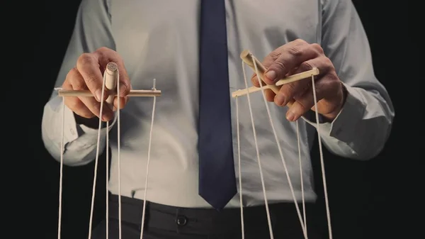 Businessman Gray Shirt Black Tie Controls Puppet Wooden Manipulator Strings — Fotografia de Stock