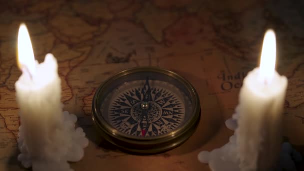 Old Vintage Retro Compass Ancient Map Composition Illuminated Candles — Stock Video