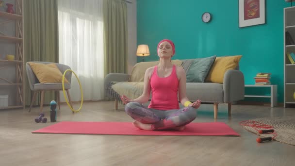 Young Attractive Woman Sits Lotus Position Her Eyes Closed Takes — Stock Video