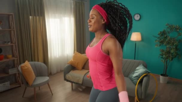 African American Woman Jumping Rope Home Living Room Cute Slim — Stock Video