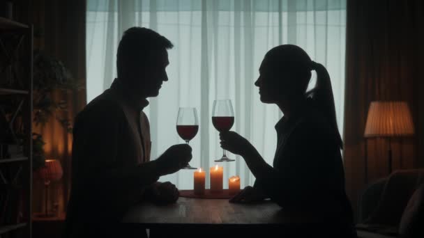 Young Couple Spends Evening Red Wine Candlelight Dark Silhouettes Man — Stock Video