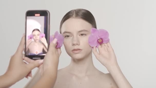 Closeup Shot Beautiful Model Posing Video Recording Smartphone Covering Her — Stock Video