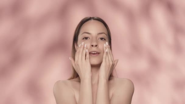 Young Woman Clothes Touches Smooth Healthy Skin Her Face Body — Stock Video