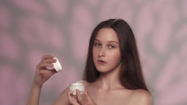 Portrait Young Model Holding Cosmetics Product Girl Opens Jar Smells — Stock Video