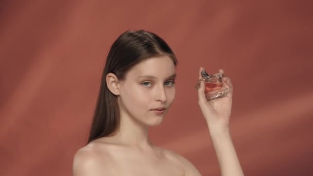 Woman Sprays Perfume Bottle Enjoys Aroma Seminude Woman Bottle Perfume — Stock Video