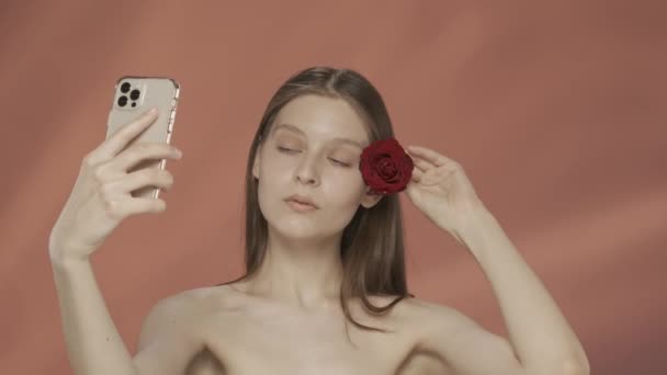 Woman Touches Her Face Hair Red Rosebud Shoots Video Takes — Stock Video