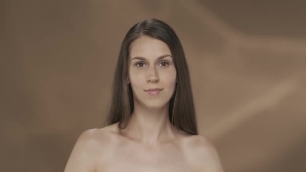 Seminude Woman Enjoys Velvety Softness Skin Her Hands Studio Brown — Stock Video