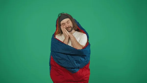 Man Traveller Sleeping Bag Looks Tired Falling Asleep His Hands — Stock Photo, Image