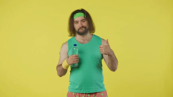 Man Sportswear Holding Bottle Water Showing Thumbs Portrait Male Model — Stock Photo, Image