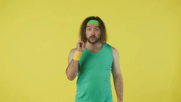 Man Sportswear Posing Camera Pointing Finger Portrait Male Model Green — Stock Photo, Image
