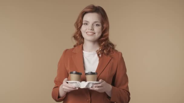 Medium Isolated Video Satisfied Happy Active Young Woman Holding Cup — Stock Video