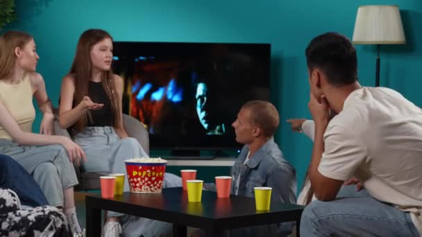 Group Teens Young People Friends Sitting Couch Watching Horror Movie — Stock Video