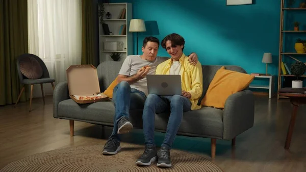 Full Size Shot Homosexual Couple Home Sitting Couch Watching Something — Stock Photo, Image