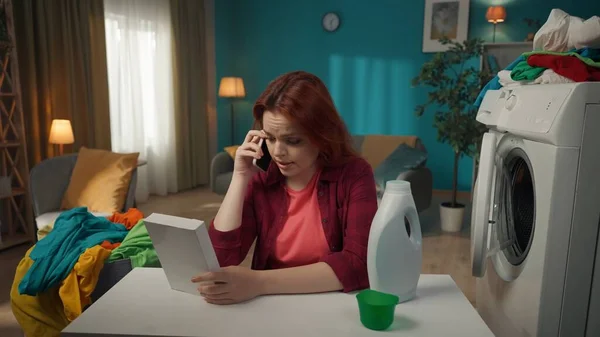 Redhead Woman Sitting Next Washing Machine Talking Phone Somebody Could — Stock Photo, Image