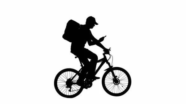 채널에 스마트 스포츠 자전거를 휴대용 남자의 실루엣 배낭과 전화와 자전거에 — 스톡 사진