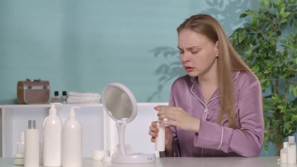 Frustrated Woman Silk Pajamas Applies Lotion Serum Cotton Pad Wipes — Stock Video