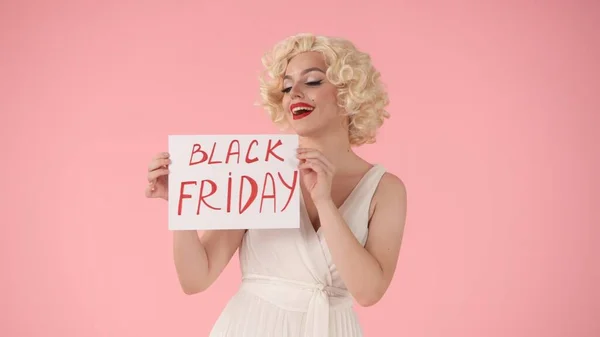 Woman Holding Poster Inscription Black Friday Woman Looking Marilyn Monroe — Stock Photo, Image