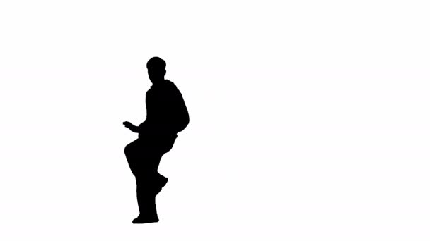 Het Kader Een Witte Achtergrond Danst Een Man Een Silhouet — Stockvideo