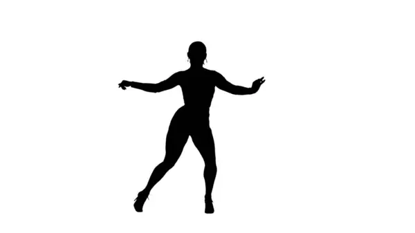在白色背景的图片中 有一个穿着高跟鞋的女人 展示舞蹈动作 略微伸展腿和胳膊分开 她很性感 中型框架 — 图库照片