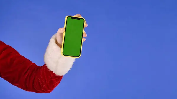 Female Hand Santa Claus Costume Green Screen Phone Isolated Blue — Stock Photo, Image
