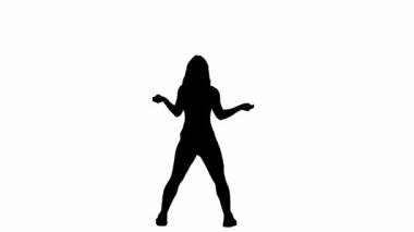 Beyaz bir arkaplanda, siluette ince bir kız duruyor. Dans hareketini twerk tarzında gösteriyor. Seksi, plastik, ritmik. Kameraya bakıyorum. Orta çerçeve. Yavaş çekim.